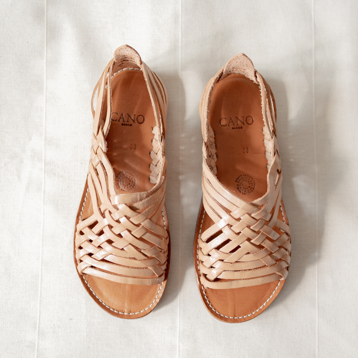 Cano Luisa Huarache Beige artisanal open sandal top view